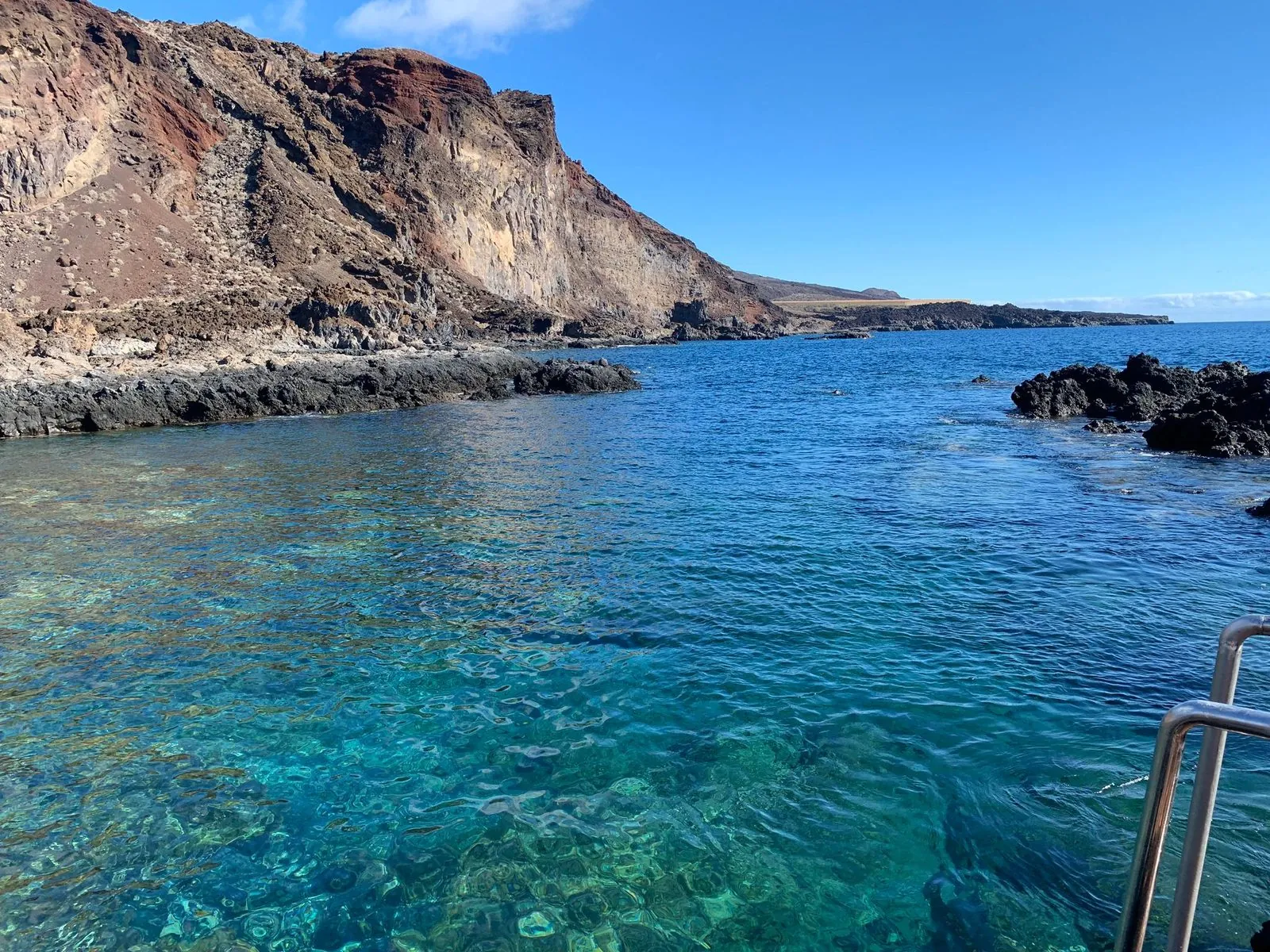 A sheltered natural bathing pool among the lava rocks at Tacorón, El Hierro