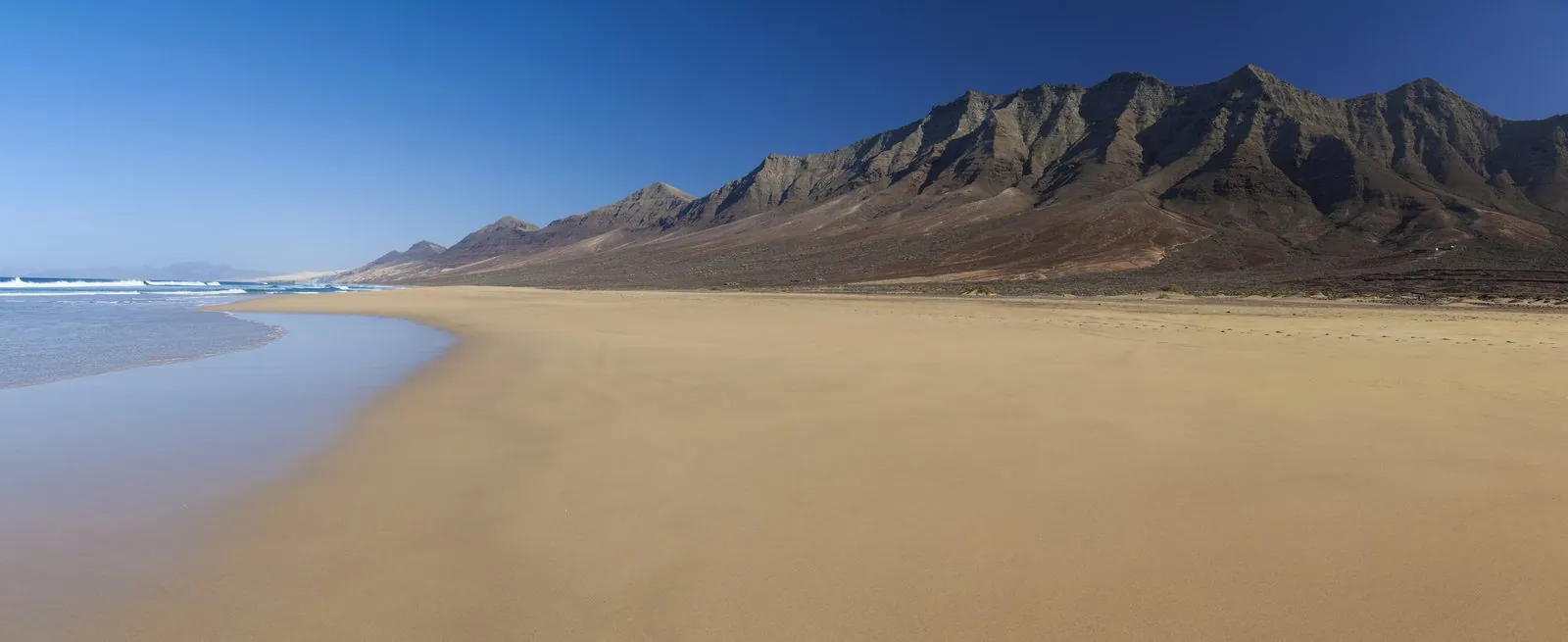 Panorama of the vast wild beach of Cofete below the Jandía mountains, Fuerteventura