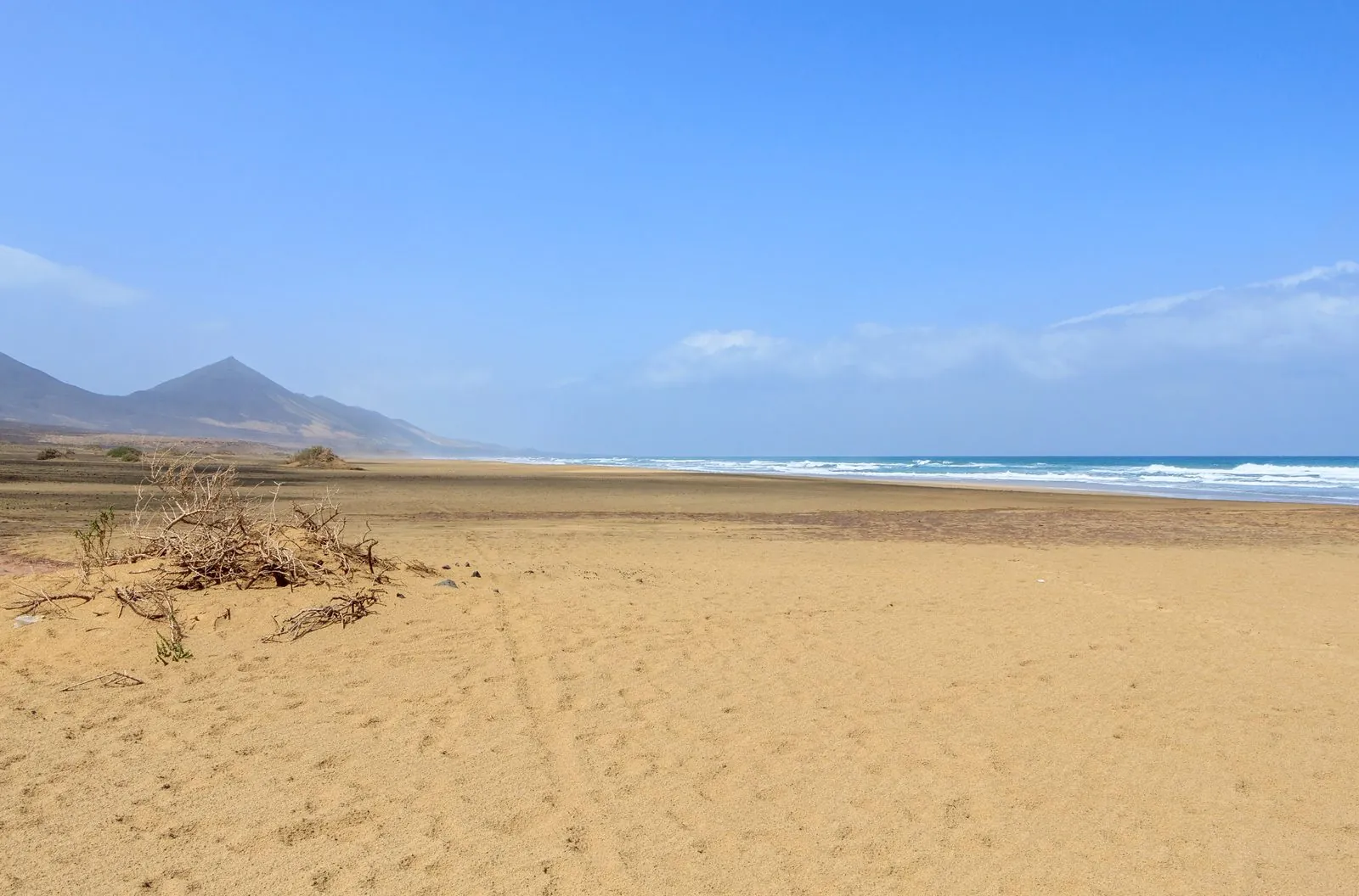 The vast wild beach of Playa de Cofete below the Jandia mountains, Fuerteventura