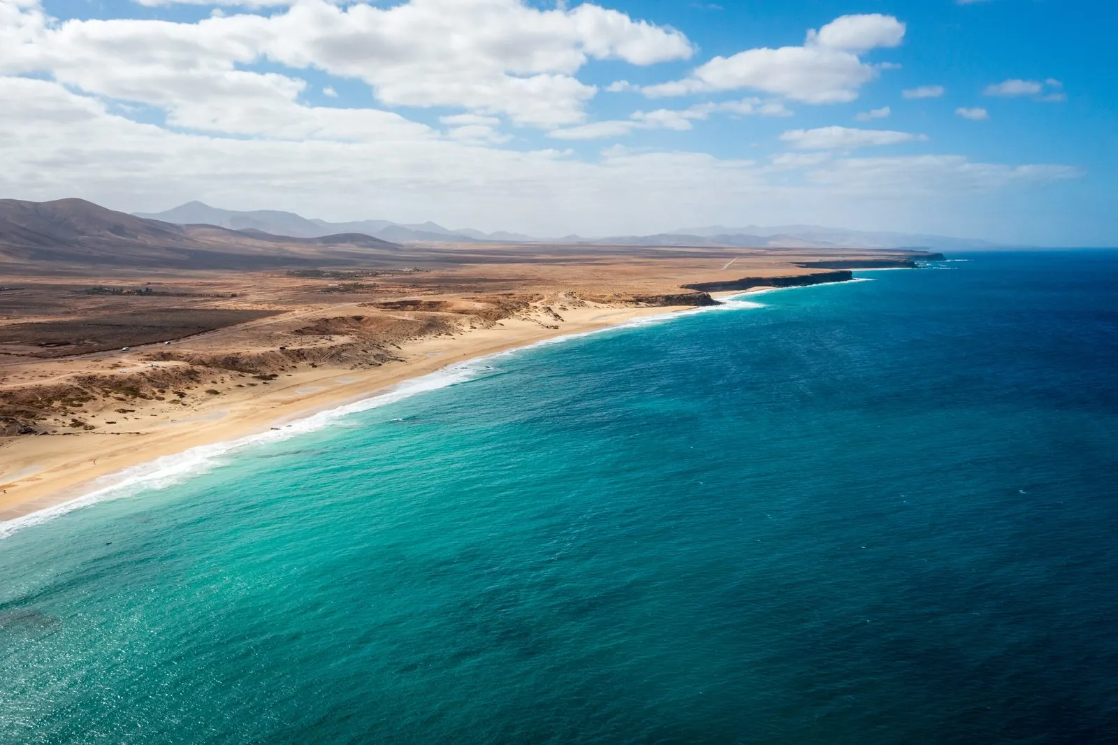 Aerial view of the sheltered lagoon beaches of El Cotillo on the west coast of Fuerteventura