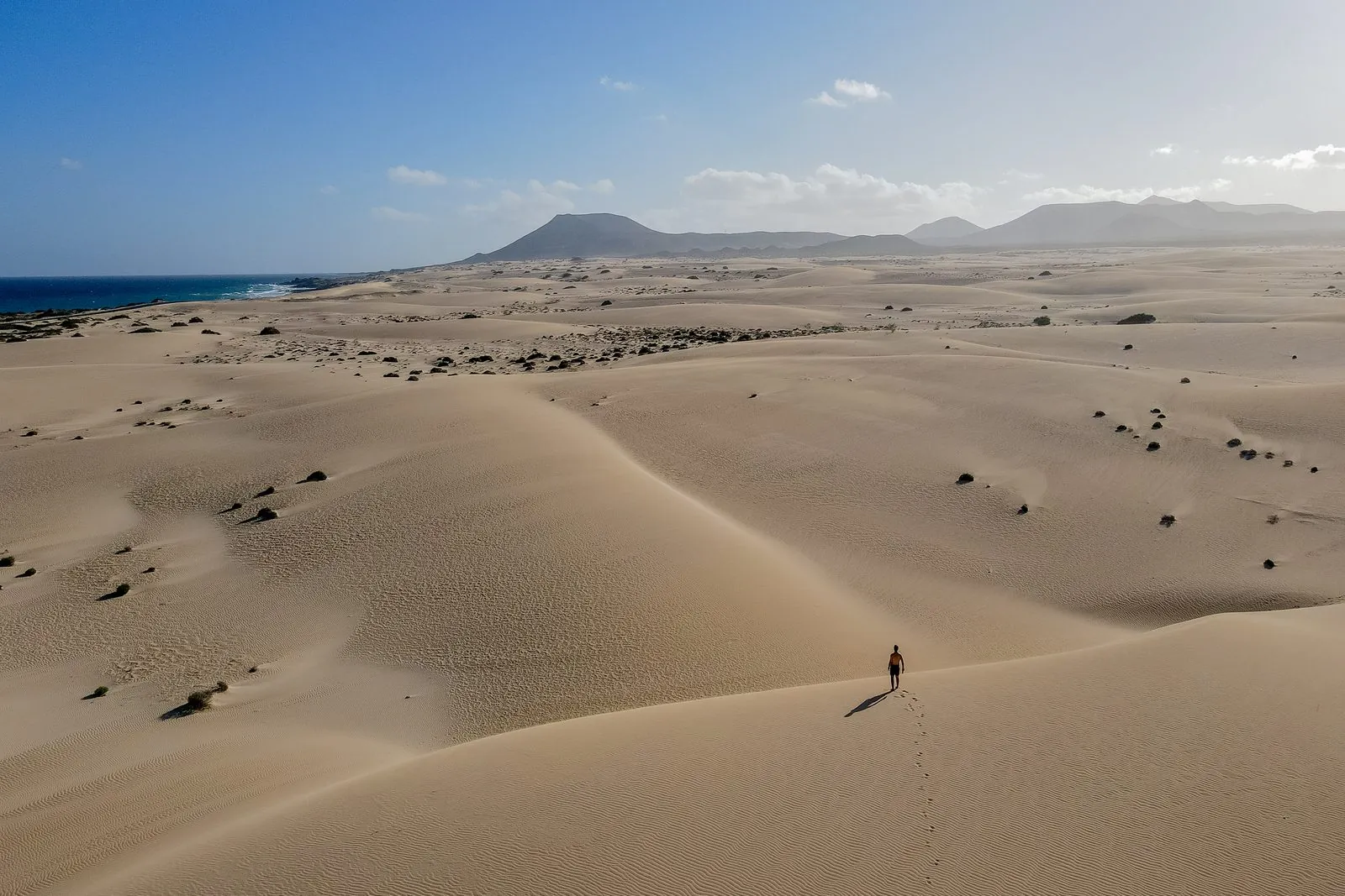 The rolling sand dunes of the Corralejo Natural Park behind the Grandes Playas, Fuerteventura