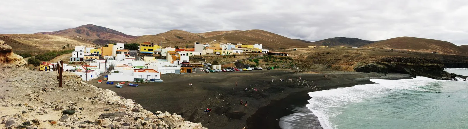 Panorama of the black-sand bay and cliffs at Ajuy, Fuerteventura