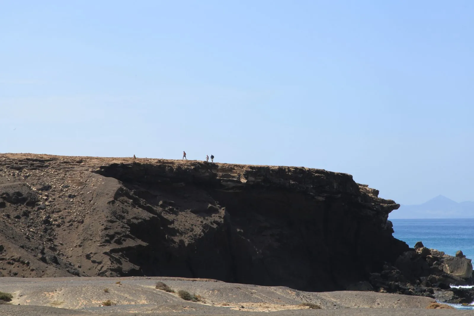 Golden sand and rocky headlands at Playa de la Pared, Fuerteventura