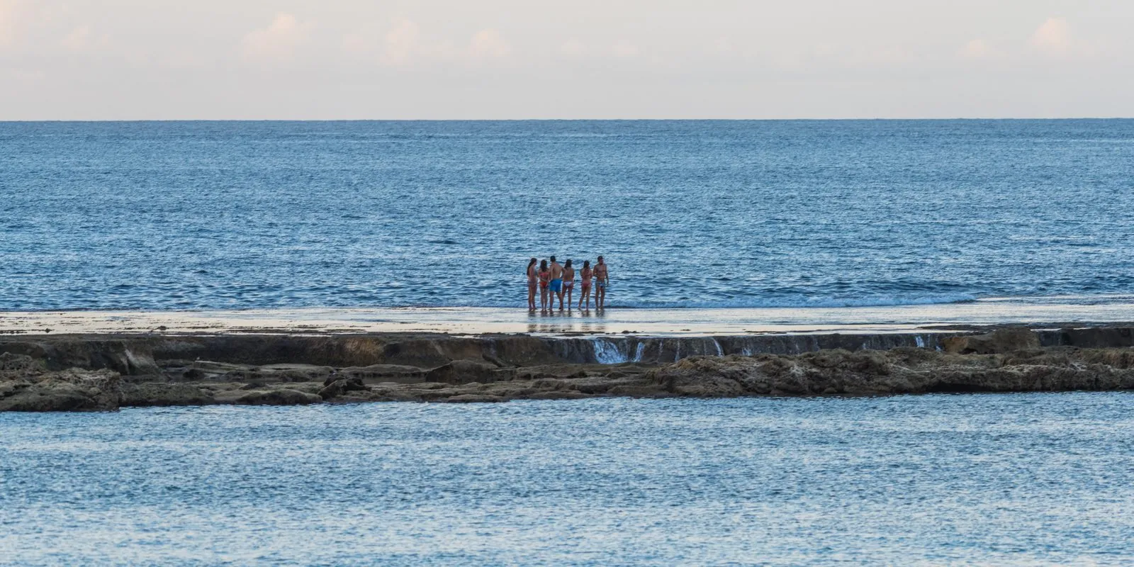 Sunbathers on the urban beach of Playa de las Canteras in Las Palmas de Gran Canaria