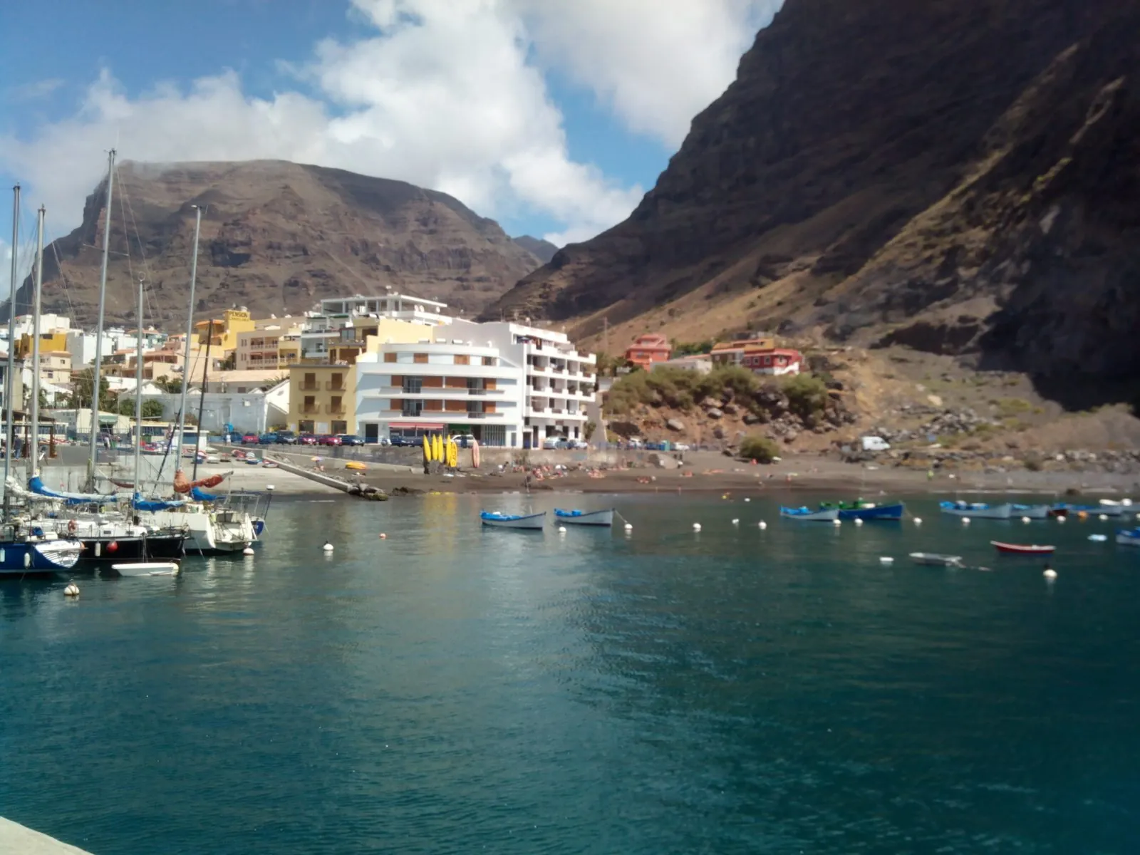 The dark-sand beach of Playa de Vueltas in Valle Gran Rey on the west coast of La Gomera