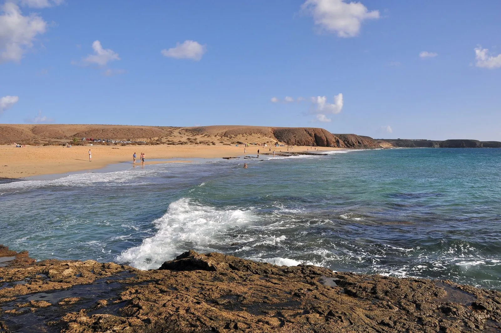 A golden cove backed by low cliffs among the Papagayo beaches of southern Lanzarote