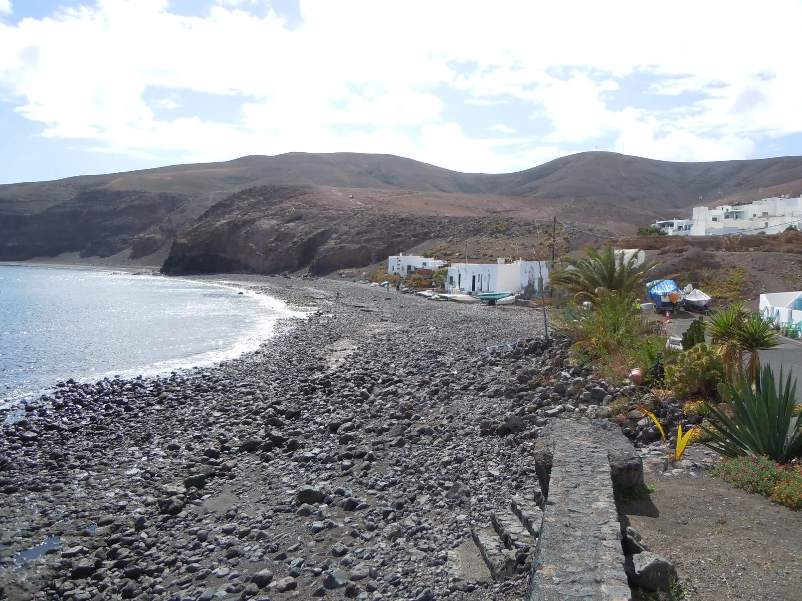 Dark pebble-and-sand beach at Playa Quemada, Lanzarote