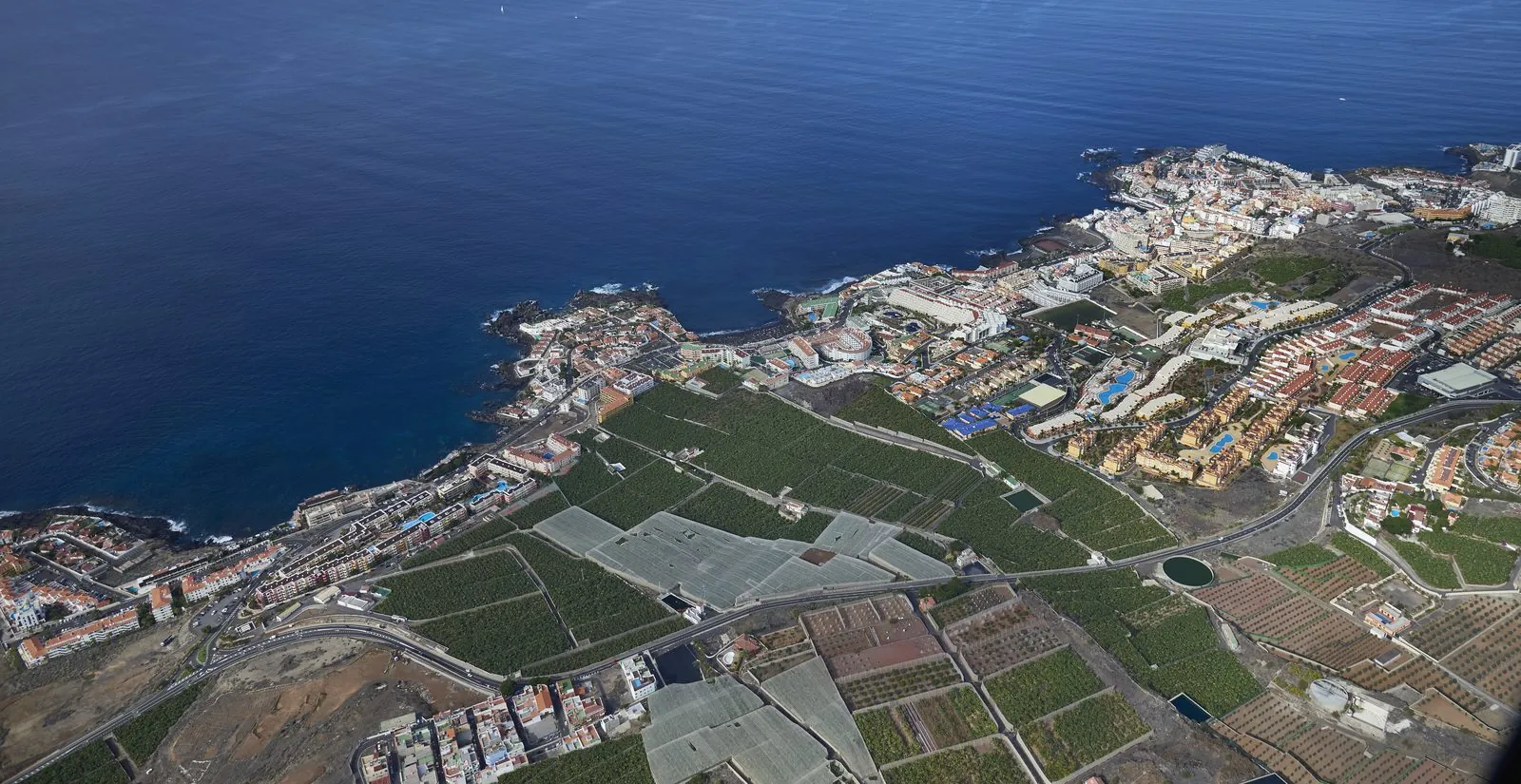 Aerial view of Playa de la Arena and the Los Gigantes cliffs on the west coast of Tenerife