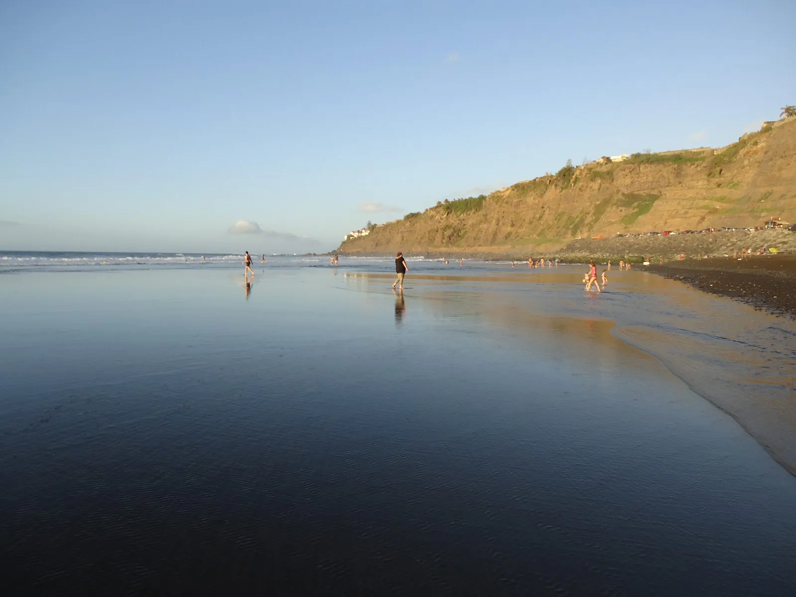 Dark volcanic sand and surf at Playa del Socorro, Los Realejos, Tenerife