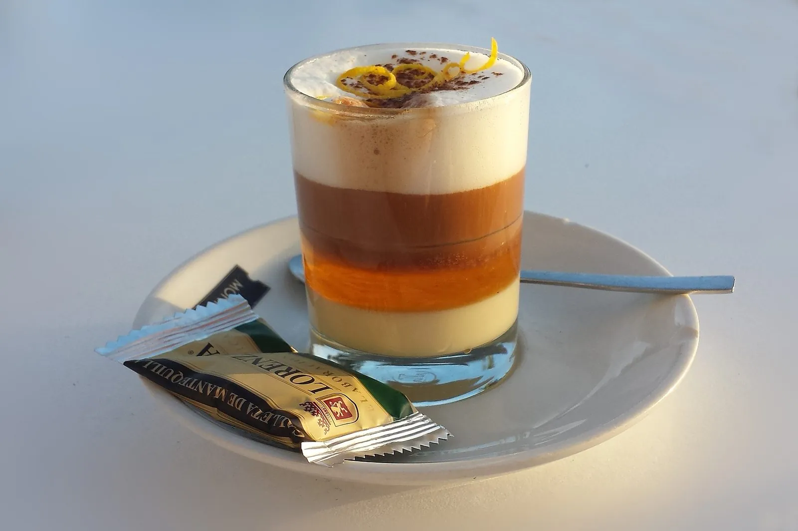 A barraquito, the layered Canarian coffee with condensed milk, Licor 43 and cinnamon