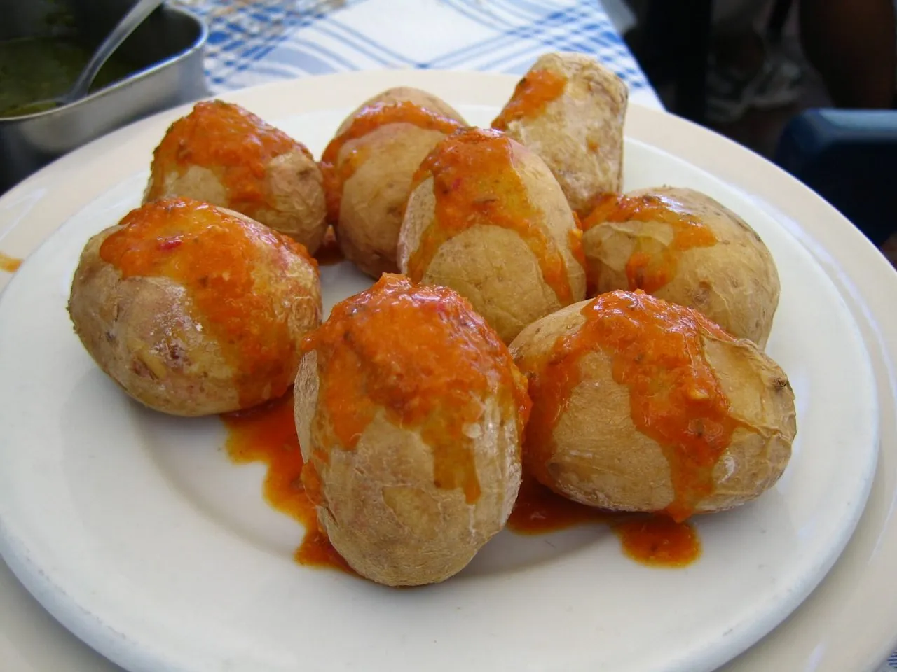 A plate of papas arrugadas with mojo, a staple served at Canarian guachinches