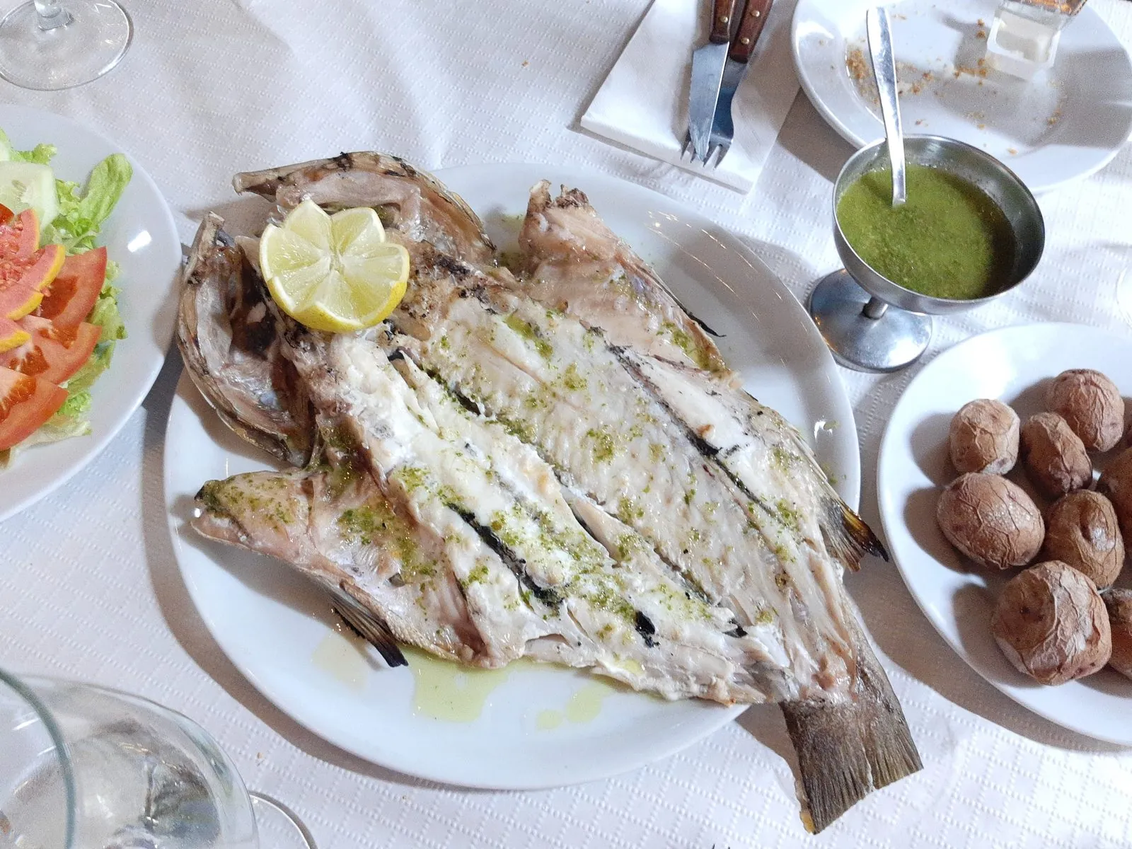 Grilled vieja (parrotfish) with papas arrugadas and mojo, a classic Canarian fish dish