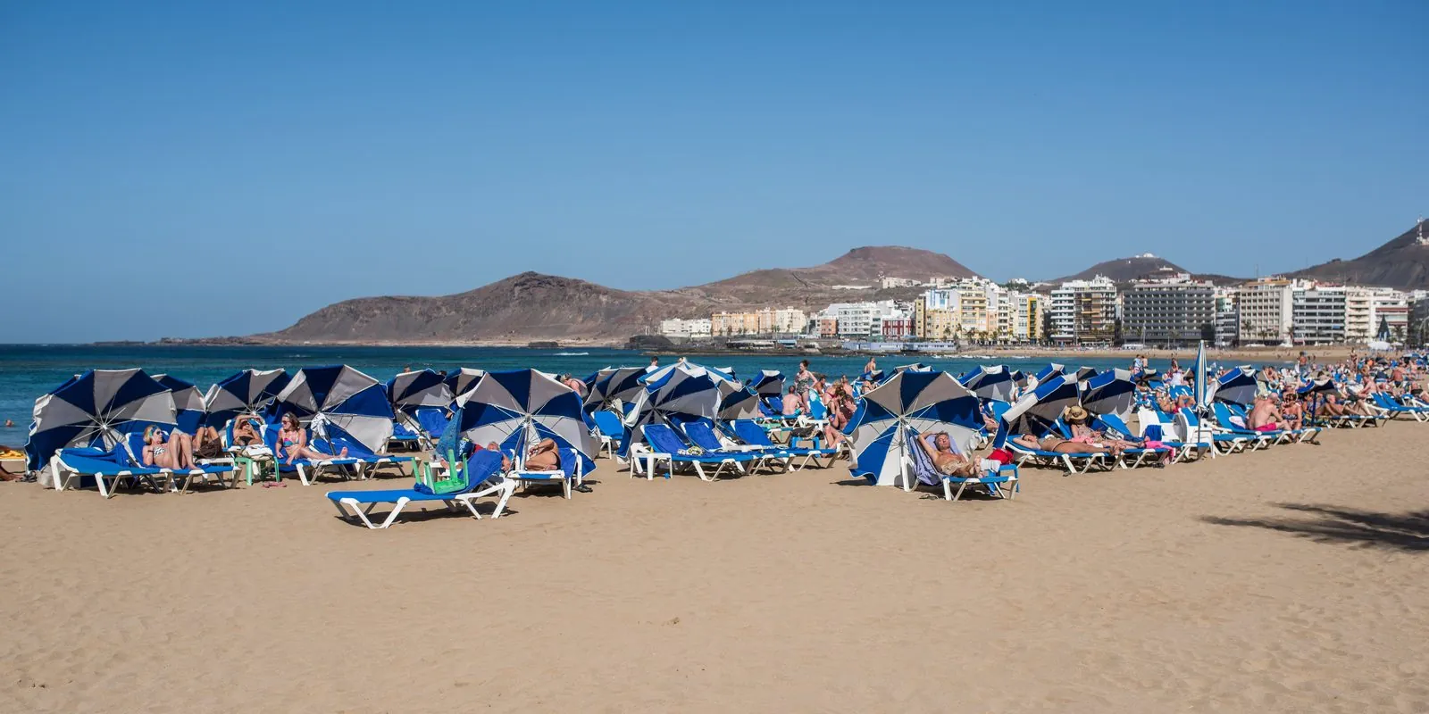 Golden sand and calm water at Playa de las Canteras, Gran Canaria