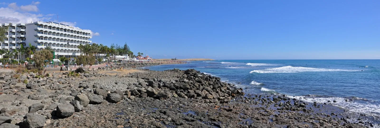 The wide golden sands of Maspalomas beach along the south coast of Gran Canaria