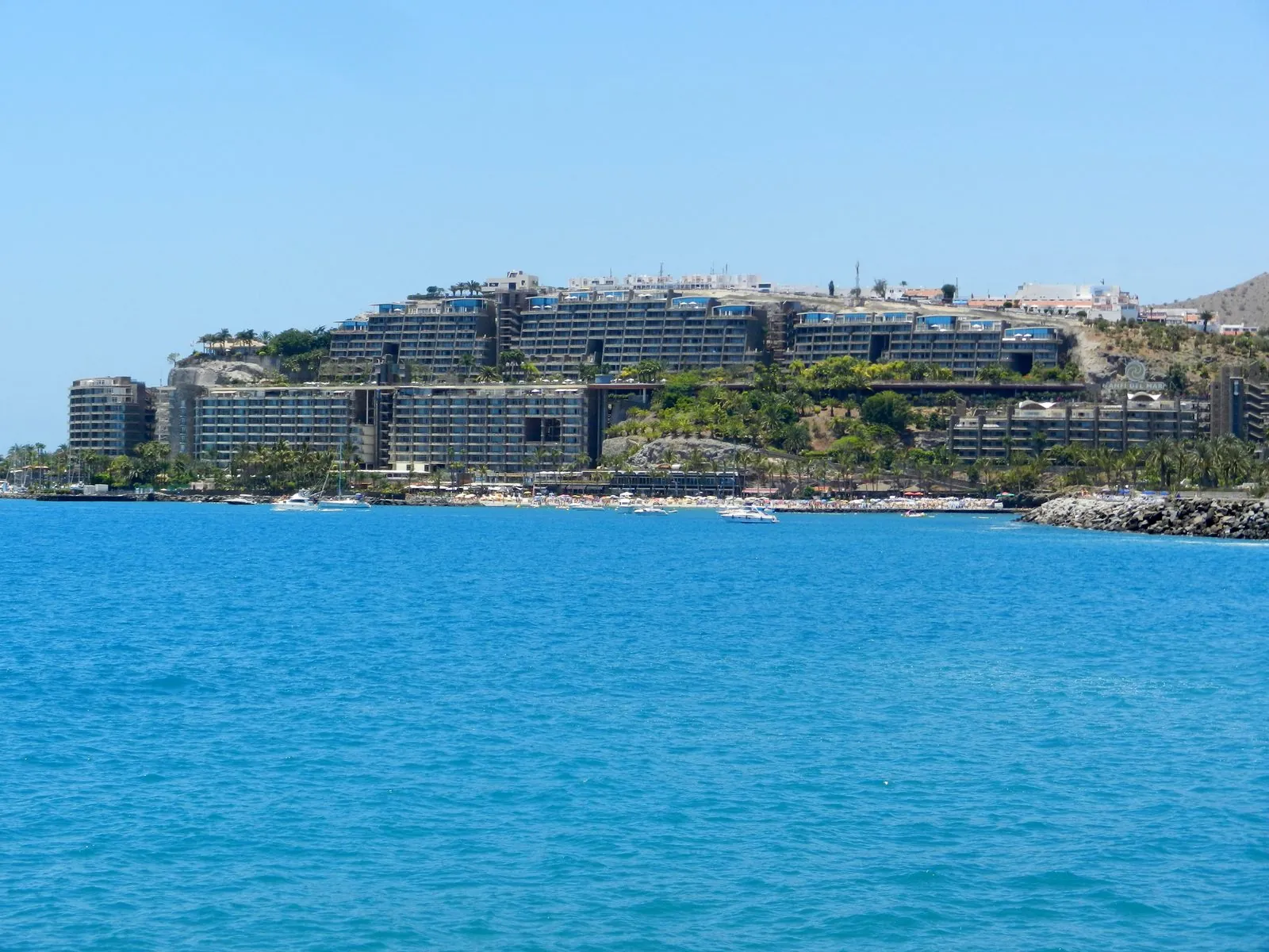The Anfi del Mar resort with its palm-lined marina and man-made white beach on southern Gran Canaria