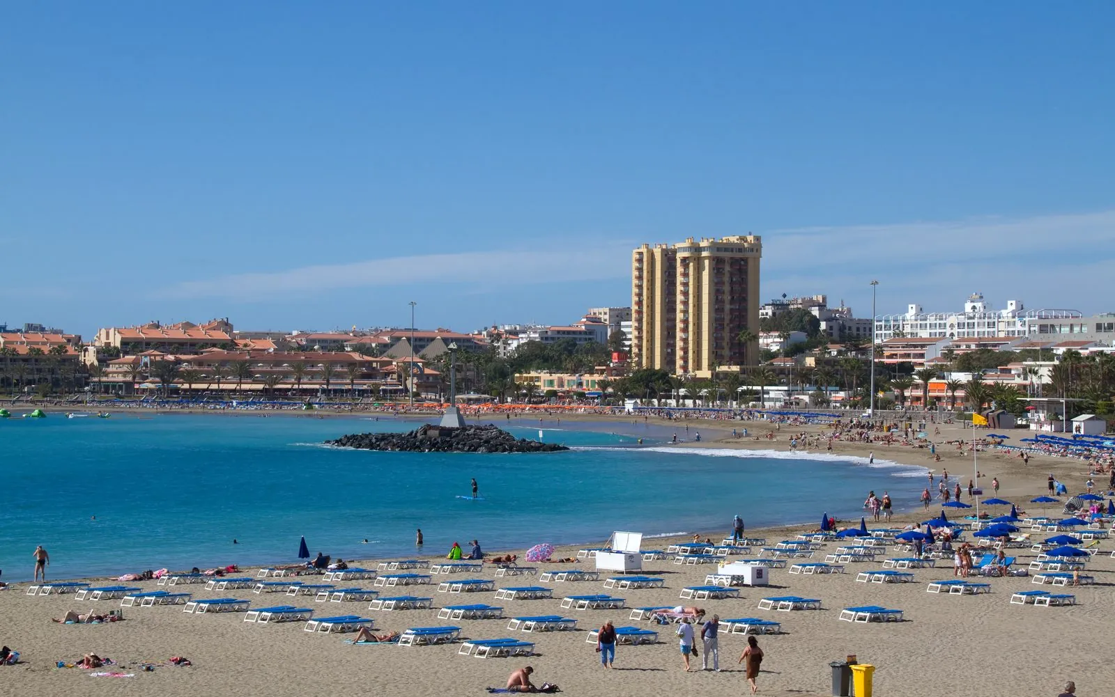 The resort beach and bay of Los Cristianos on the south coast of Tenerife