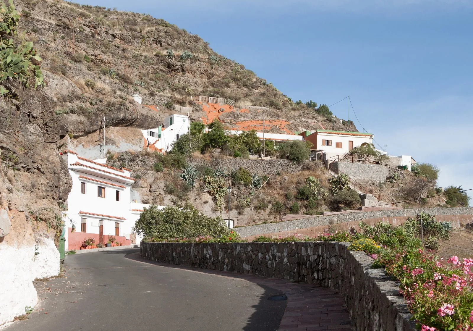 Whitewashed cave houses built into the rock at Artenara, Gran Canaria