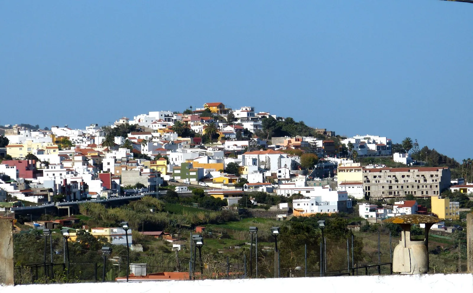 View across the whitewashed hillside town of Firgas on Gran Canaria