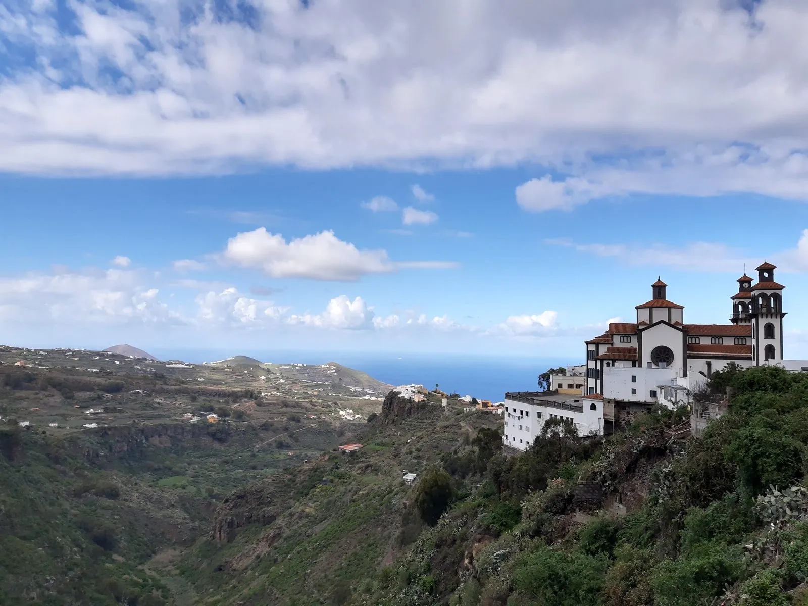Moya church perched above the barranco looking north towards the coast