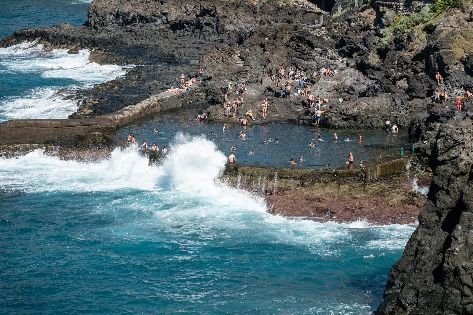 Natural seawater pool on the rocky shore of Puerto de Santiago, Tenerife