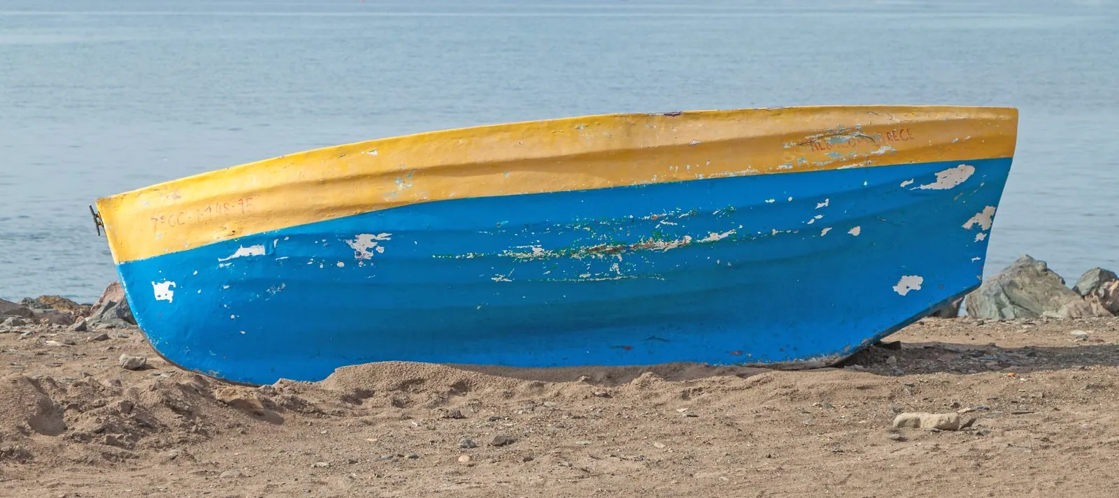 A boat drawn up on the sheltered beach at San Agustín, Gran Canaria