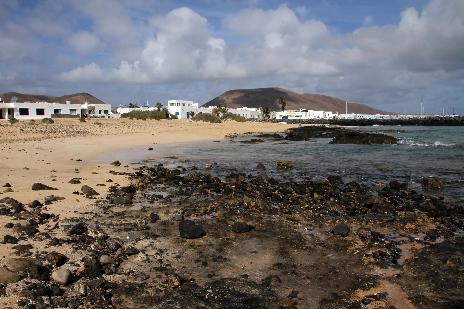View over the island of La Graciosa towards the village of Caleta del Sebo