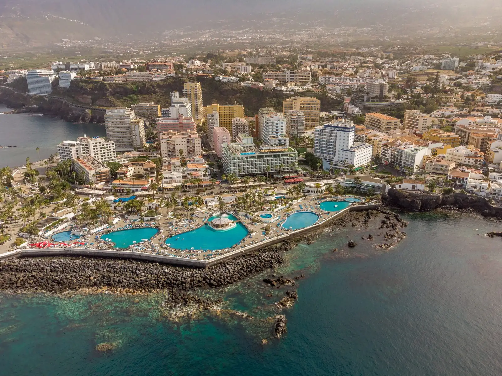 The pools and palm-lined terraces of Lago Martiánez, Puerto de la Cruz, Tenerife