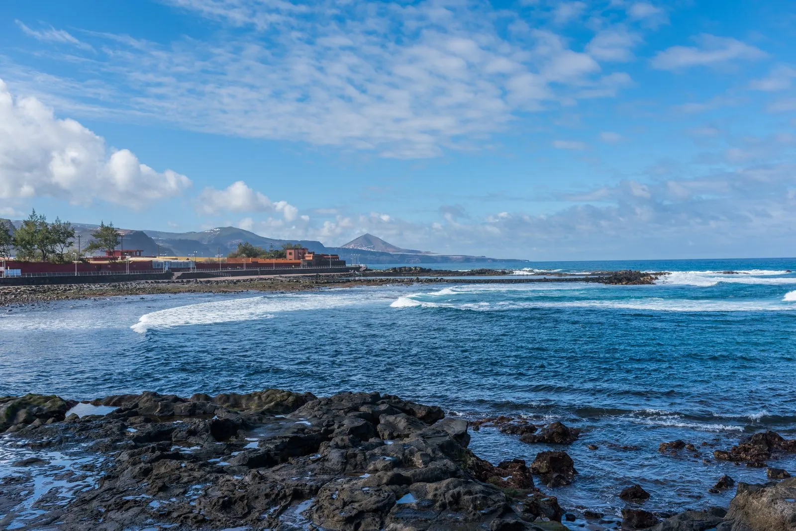 The rocky coast and natural sea pools at El Puertillo, Banaderos, on the north coast of Gran Canaria