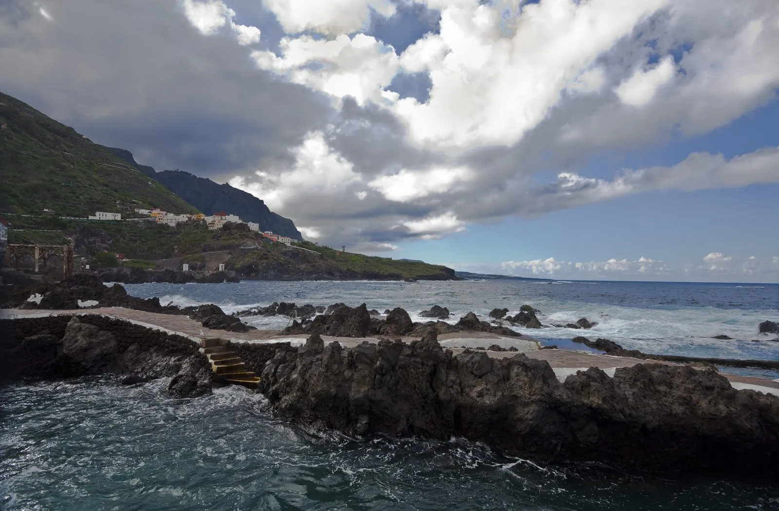 Bathers and rock pools at El Caleton, Garachico, on the north coast of Tenerife