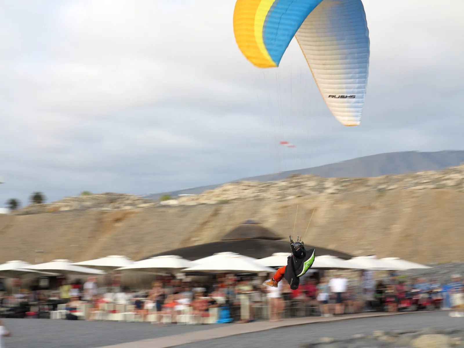 A paraglider in flight over Costa Adeje, Tenerife
