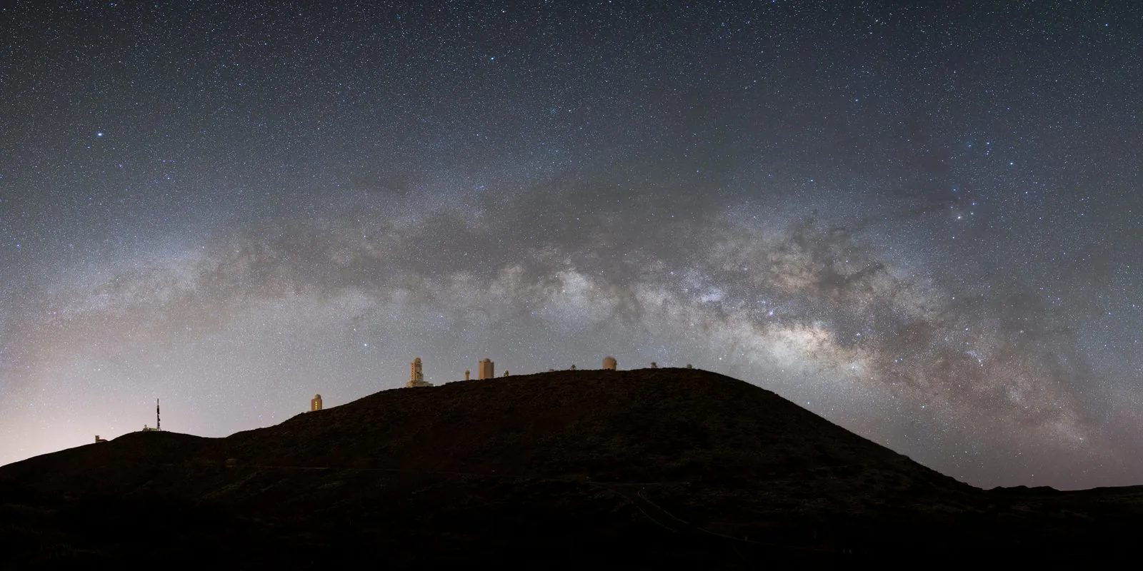 The domes of the Teide Observatory beneath a clear sky on Tenerife